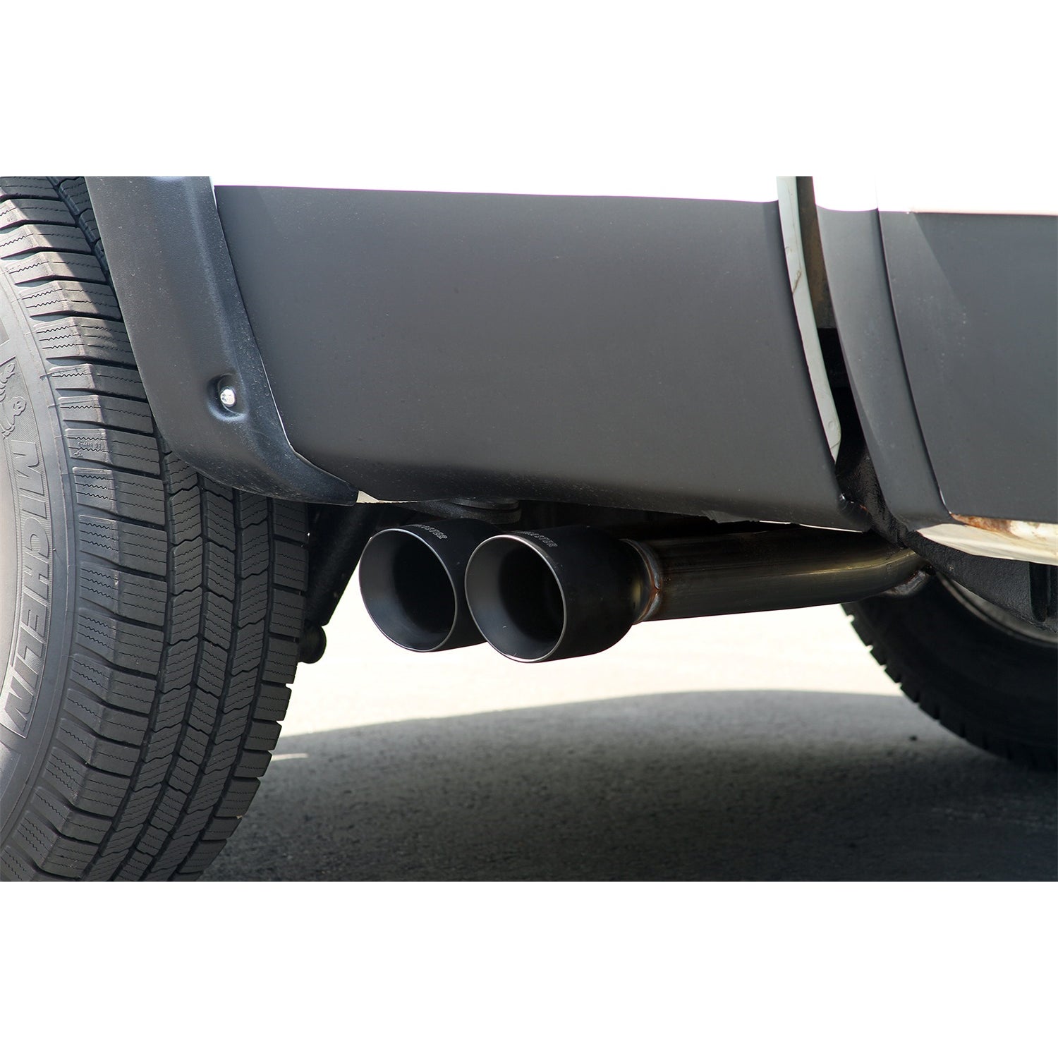 Flowmaster FlowFX Exhaust System - Cat-Back - 2-1/2" Diameter - Side Exit - Dual 4" Black Tips - Stainless