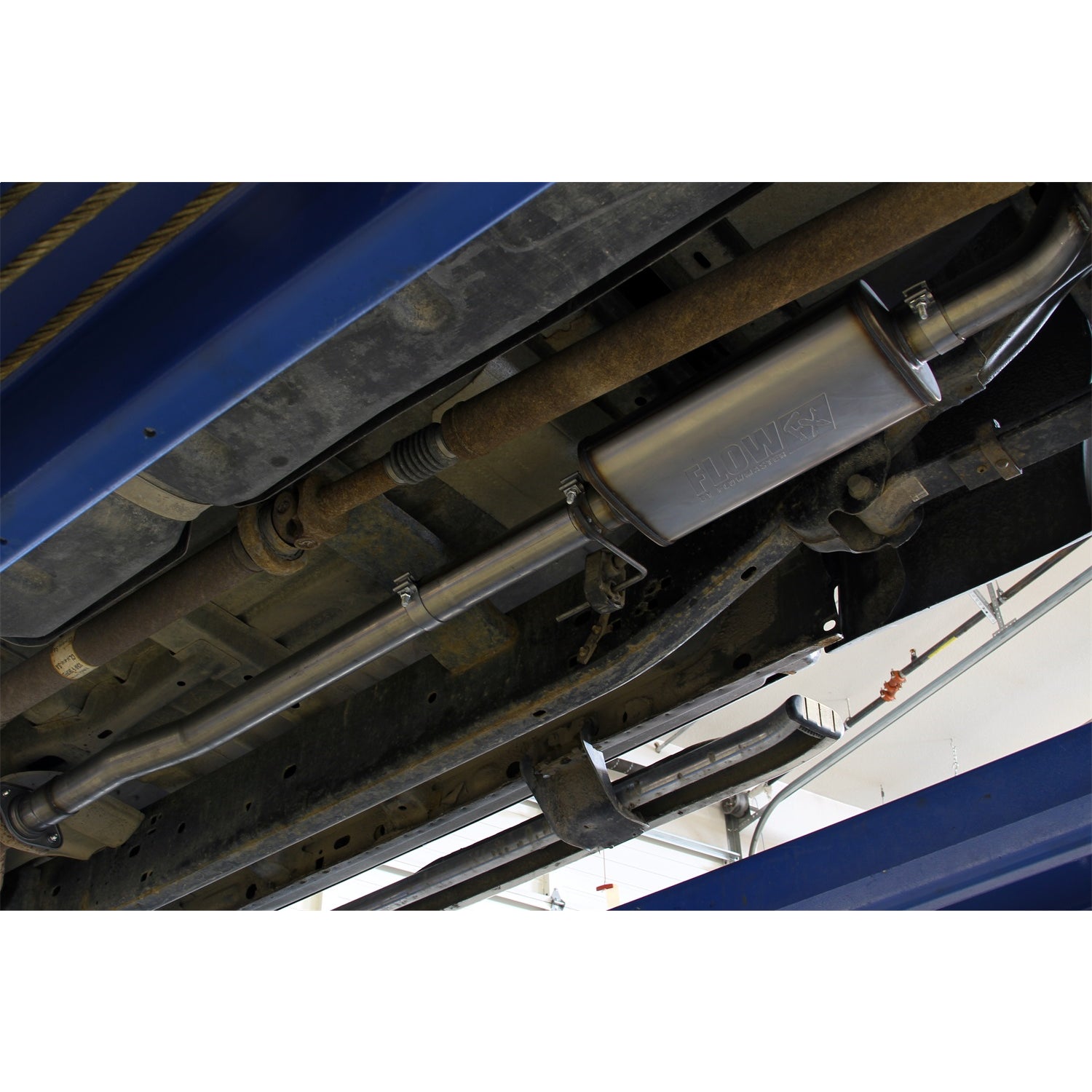 Flowmaster FlowFx Exhaust System - Cat-Back - 3" Diameter - Single Side Exit - 4-1/2" Black Ceramic Tip - Stainless