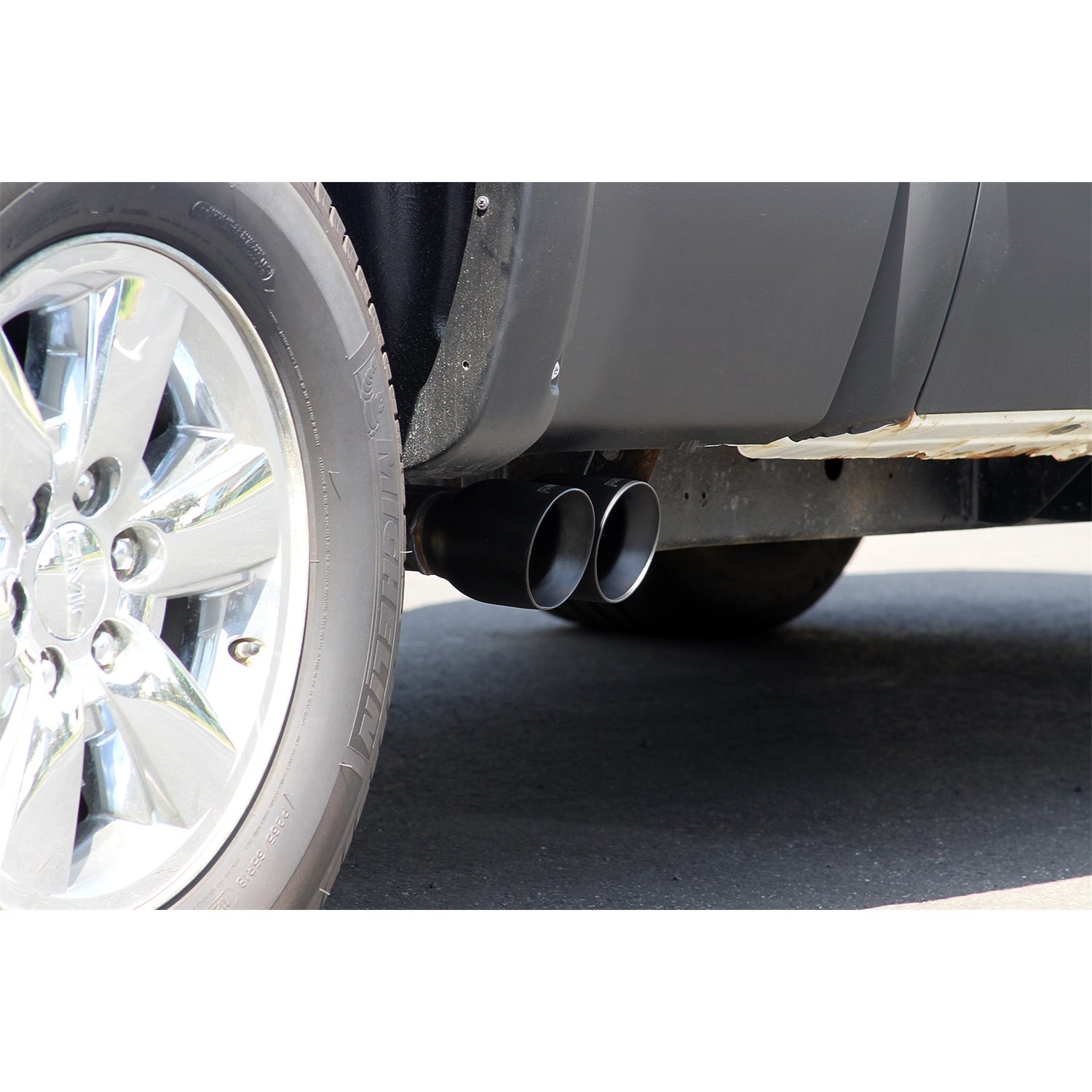 Flowmaster FlowFX Exhaust System - Cat-Back - 2-1/2" Diameter - Side Exit - Dual 4" Black Tips - Stainless